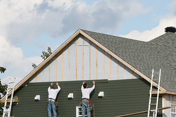 Professional Siding technician working in Warrington, FL